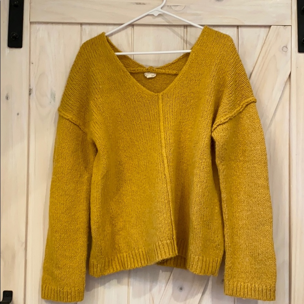 Yellow knitted sweater